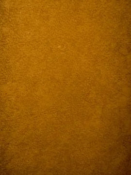 Brown textured wall surface with subtle rough pattern background Stock Photos