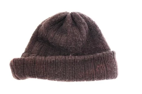 A brown thick wool beanie hat cap perfect for winter weather. isolated on whi Stock Photos