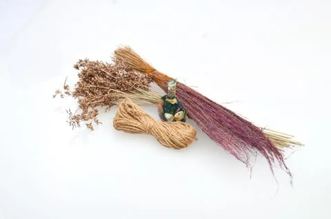 Brown threads and mini bottle are used as material to make women's accessorie Stock Photos