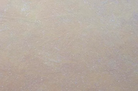 Brown wall decorated with a solution of clay with white patches. Foto stock