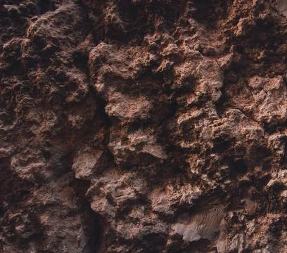 Brown wall texture. Stone background. Rock texture. Grunge Rough structure. A Stock Photos