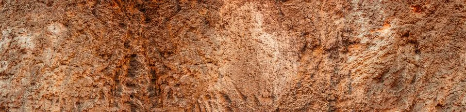 Brown wall texture. Stone background. Rock texture. Grunge Rough structure. A Stock Photos