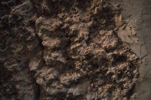 Brown wall texture. Stone background. Rock texture. Grunge Rough structure. A Stock Photos