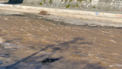  The brown waters of river Mapocho flow Stock Footage 97213680