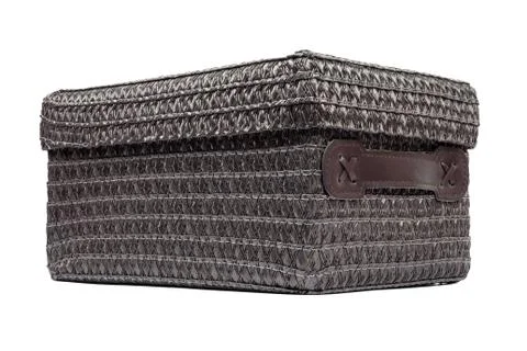 Brown wicker box on white background Stock Photos