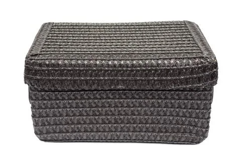 Brown wicker box on white background Stock Photos