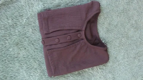 A brown women's blouse look Video stock 276479604