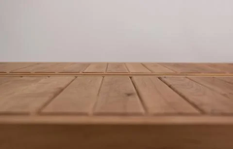 Brown wooden table perspective surface and white wall background Stock Photos