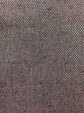 Brown woven fabric with smooth solid panel Stock Photos