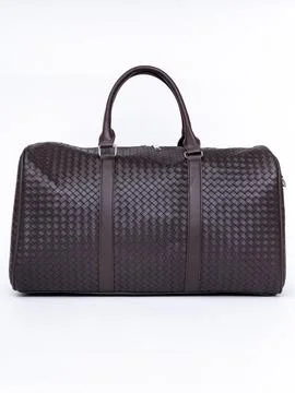 Brown woven pattern duffel bag Stock Photos