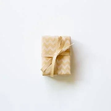 Brown zigzag pattern gift box isolated on white background Stock Photos