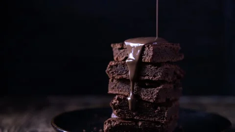 Brownie on a plate on a dark background, close up Stock Footage 169801257