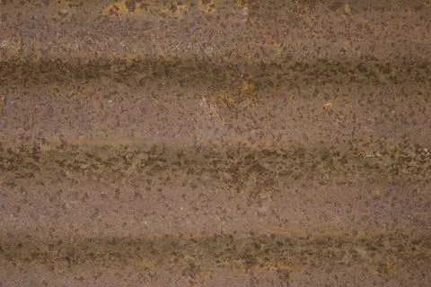 Brownish orange horizontal lines of rusty metal. deep rust. corrugated rusty  Foto stock