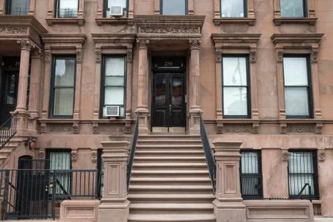 Brownstone houses in Harlem New York City Stock Photos