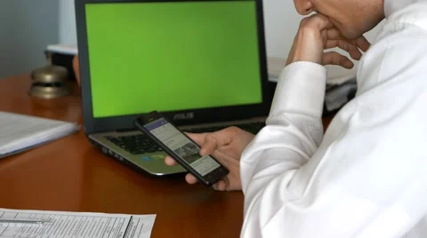 Browse the social network instead of working Stock Footage 60765765