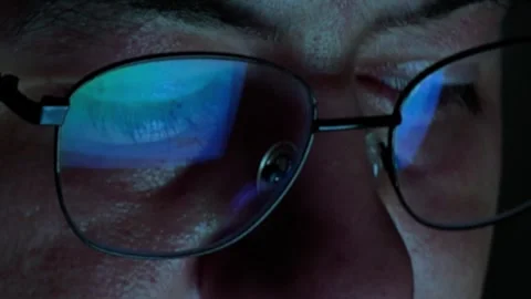 Browsing And Scrolling Social Media Feed Reflection On Glasses Screen Stock Footage 343021077