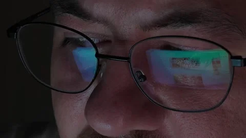 Browsing And Scrolling Social Media Feed Reflection On Glasses Screen Stock Footage 343021165