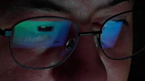 Browsing And Scrolling Social Media Feed Reflection On Glasses Screen Stock Footage 343021167