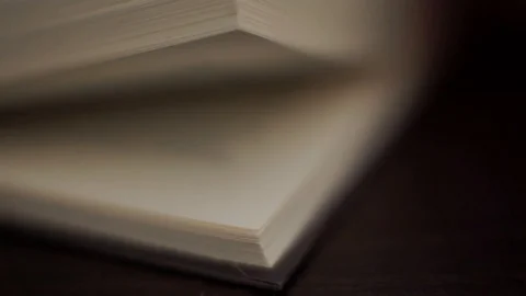 Browsing book pages close up shot shallow depth of field1 Stock Footage 115662387