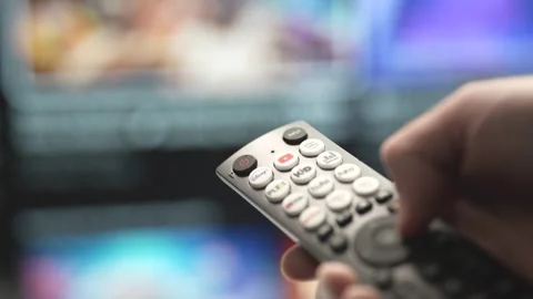 Browsing Content on a Smart TV With a Remote Control Closeup Stock Footage 255099480