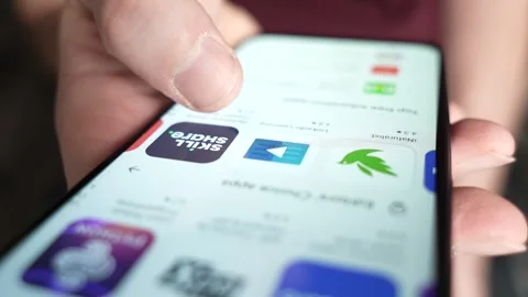 Browsing Educational Apps on a Smartphone Closeup Stock Footage 270816446