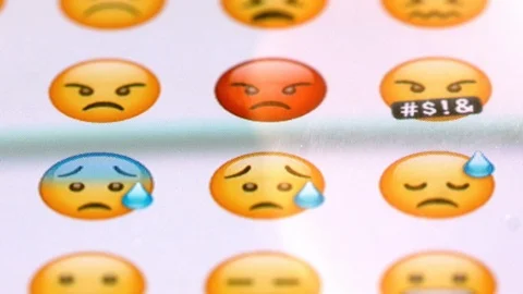 Browsing emojis on a virtual keyboard Stock Footage 127297858