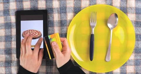 Browsing fast food menu on tablet and making online order. Stock Footage 148629538