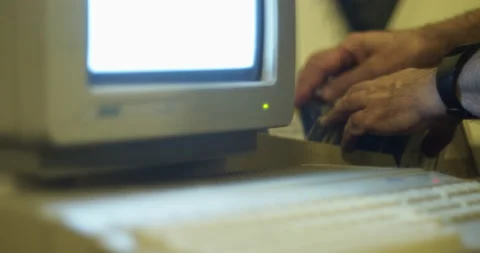 Browsing floppy disk drives for vintage PC from the 80s Stock Footage 148787640