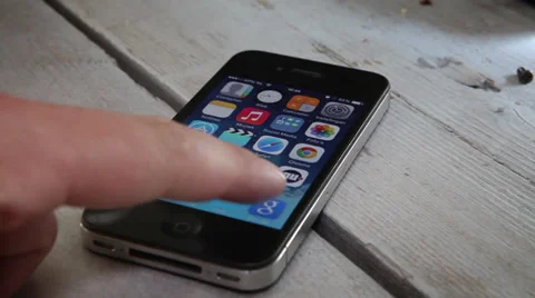 Browsing to google with Iphone 4S Stock Footage 39769905