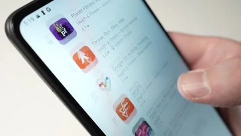 Browsing Health Apps on a Smartphone Screen Closeup Stock Footage 270815453