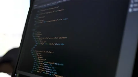 Browsing HTML code on the desktop computer screen. Web page code. Hacking Stock Footage 212369816