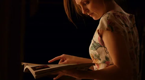 Browsing of the illustrated magazine Stock Footage 60071768