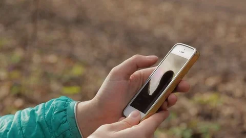 Browsing Information On Smartphone Stock Footage 73990747