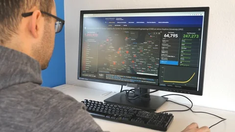 Browsing Interactive Map Showing Over 1 million Coronavirus COVID-19 Cases In Stock Footage 127767757