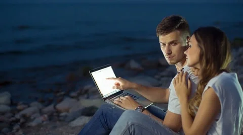 Browsing the Internet on the Beach Stock Footage 67462455