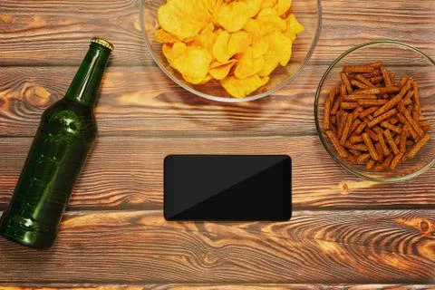 Browsing internet with smartphone in bar concept Stock Photos