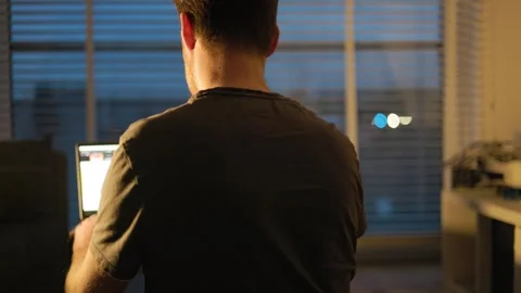 Browsing the Internet on a winter evening 動画素材 273138089