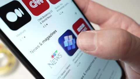 Browsing News Apps on a Smartphone Screen Closeup Stock Footage 270816072