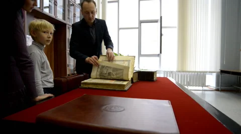 Browsing the old book Video stock 42612307