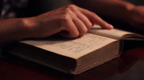 Browsing Pages of Old Book Stock Footage 46111556