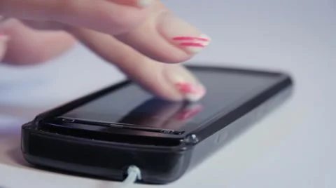 Browsing on the phone Video stock 12418948