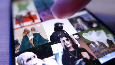 Browsing Pictures on Instagram App on a Smart Phone Stock Footage 164414467