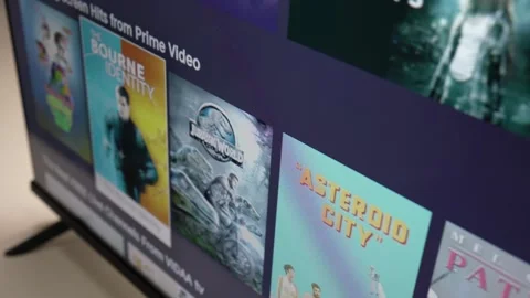 Browsing a Smart TV User Interface With Movies to Watch Stock Footage 255099026