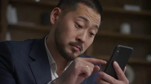 Browsing on Smartphone. Man Using Smart Phone Stock Footage 219528637