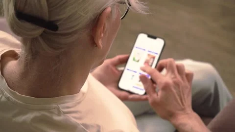 Browsing on a smartphone in a serene moment Stock Footage 302745075
