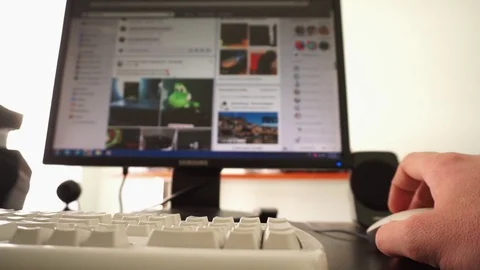 Browsing on social media on desktop computer Stock Footage 105664505