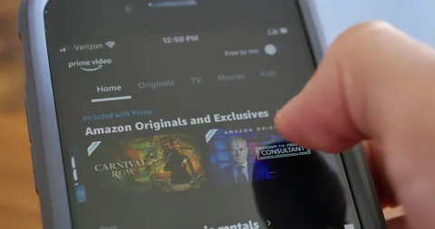 Browsing through TV Program Options on Amazon Prime Video platform 스톡 동영상 237278188