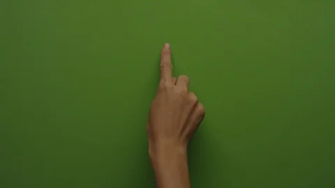 Browsing touch screen display with index finger on green screen Vidéo 94728549