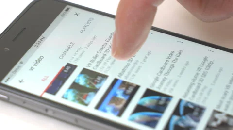 Browsing VR videos on iPhone YouTube app Stock Footage 63267704