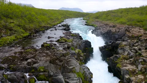 Bruarfoss waterfall and Bruara River Stock Footage 248452938